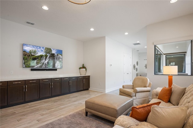 living room featuring light wood-type flooring