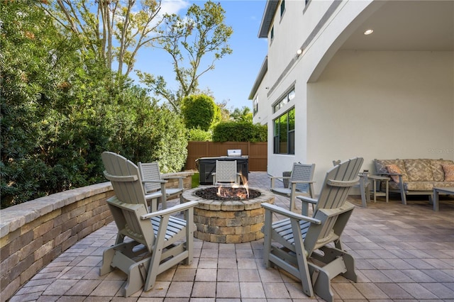 view of patio featuring a fire pit