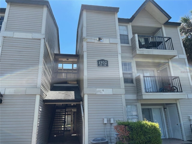 view of property featuring central AC unit