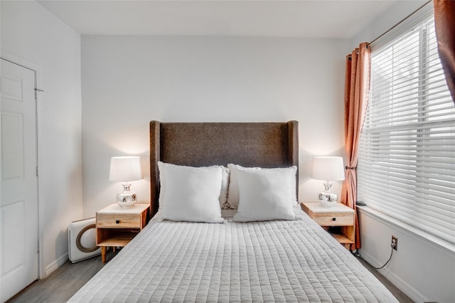 bedroom featuring light hardwood / wood-style floors