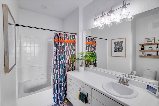 full bathroom featuring vanity, toilet, and shower / tub combo with curtain