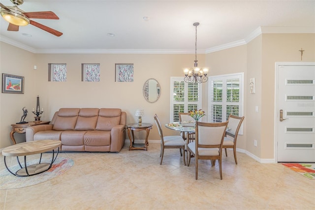 dining room with light tile patterned floors, crown molding, baseboards, and ceiling fan with notable chandelier