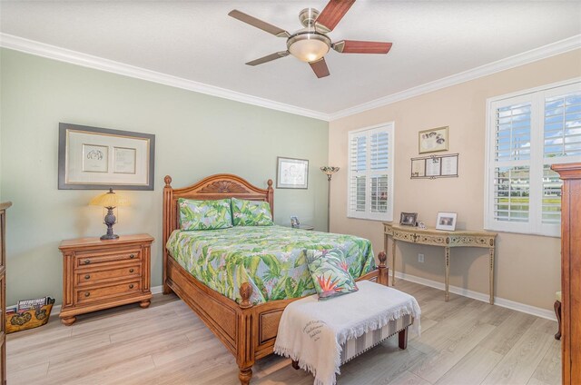 bedroom with light wood-type flooring, ceiling fan, baseboards, and crown molding