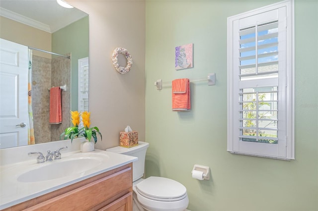 full bath featuring ornamental molding, walk in shower, vanity, and toilet