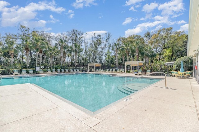 pool with a patio