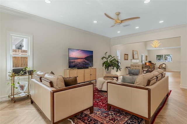 living room featuring light parquet flooring, ornamental molding, and ceiling fan