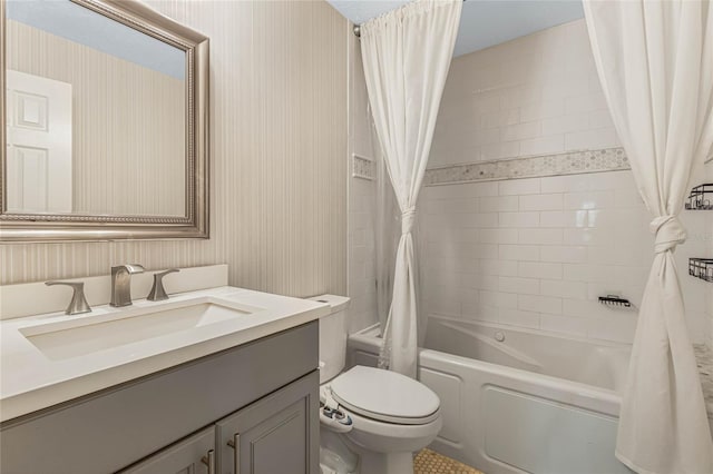 full bathroom featuring vanity, shower / tub combo with curtain, and toilet