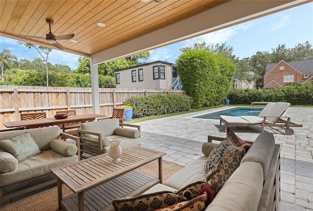 view of patio featuring outdoor lounge area and ceiling fan