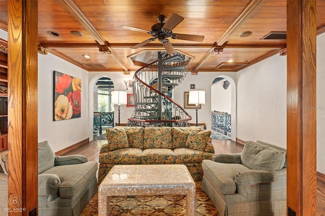 living room featuring coffered ceiling, hardwood / wood-style floors, wooden ceiling, and ceiling fan