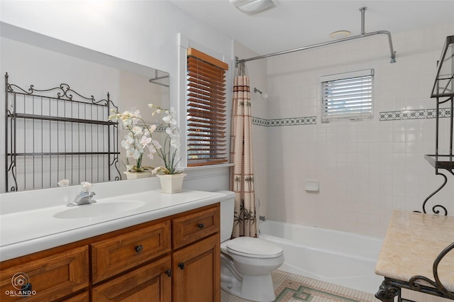 full bathroom featuring vanity, shower / tub combo, tile patterned flooring, and toilet