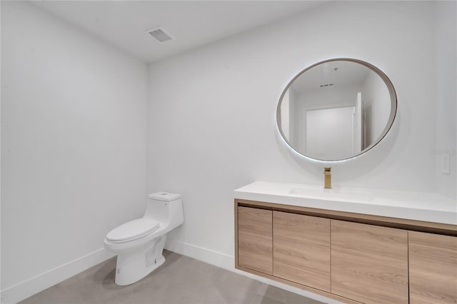 bathroom with visible vents, baseboards, toilet, and vanity