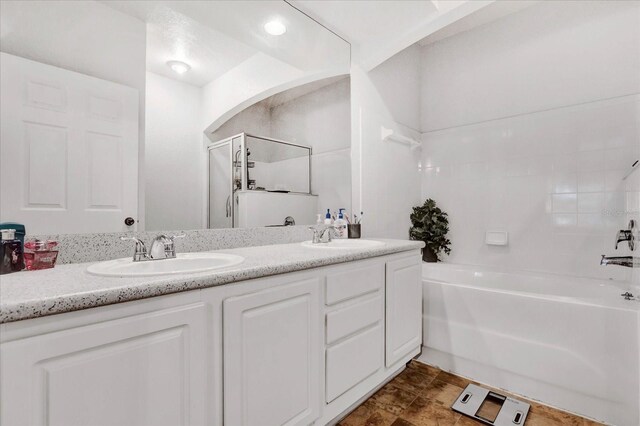 bathroom featuring vanity and a bathing tub