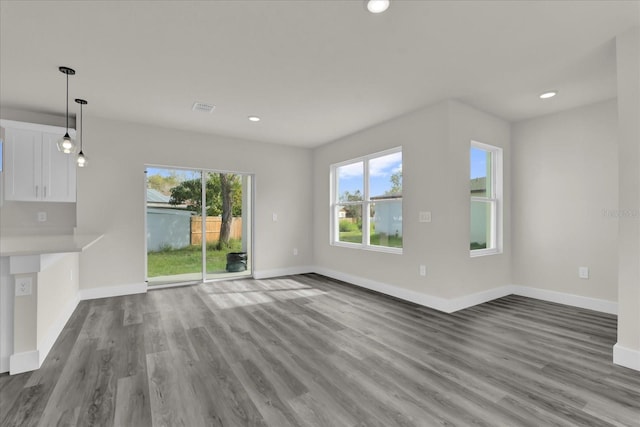 unfurnished living room featuring light hardwood / wood-style flooring