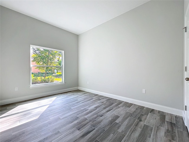 empty room featuring hardwood / wood-style floors