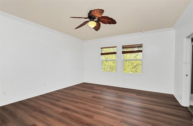 empty room with dark wood-type flooring, ornamental molding, and ceiling fan