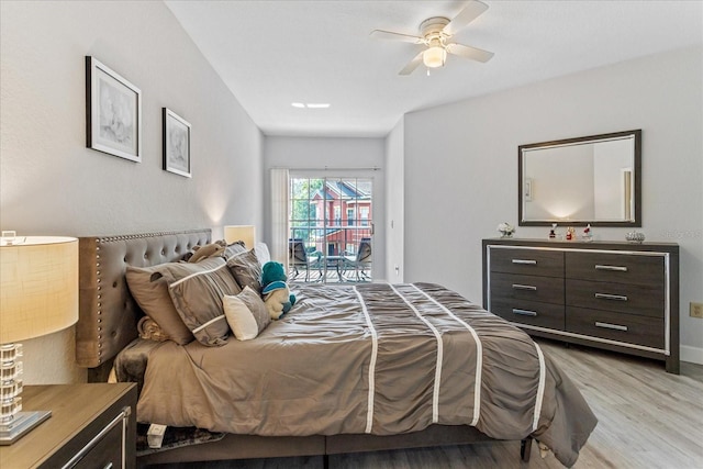 bedroom featuring light hardwood / wood-style flooring, access to outside, and ceiling fan