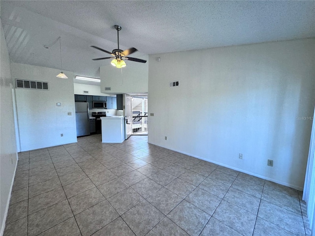 unfurnished living room with tile patterned floors, high vaulted ceiling, a textured ceiling, and ceiling fan