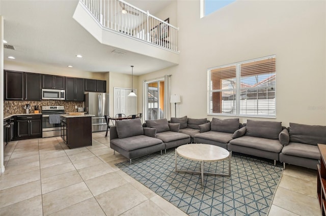 tiled living room with plenty of natural light