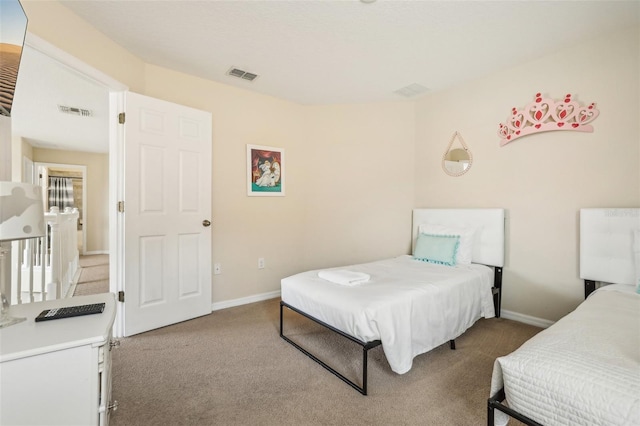 bedroom featuring carpet