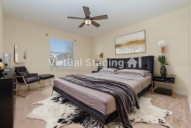 carpeted bedroom with ceiling fan