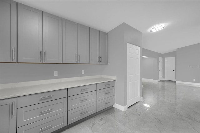 kitchen featuring gray cabinets