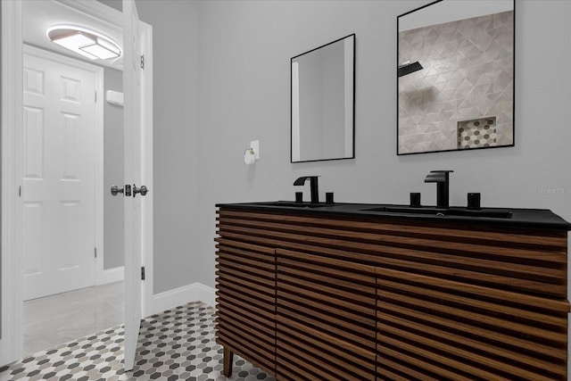 bathroom with vanity and walk in shower