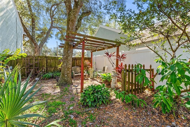 view of yard with a pergola