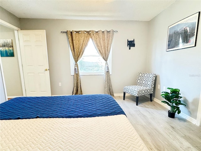 bedroom featuring hardwood / wood-style floors