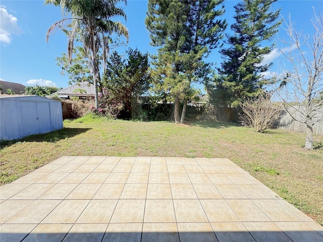 view of patio / terrace with a storage shed