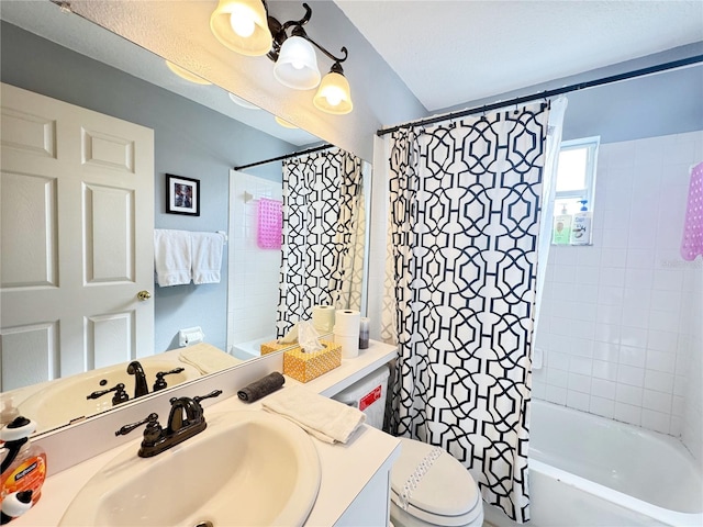 full bathroom featuring vanity, shower / bath combination with curtain, and toilet