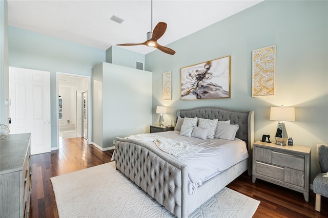 bedroom with ceiling fan, lofted ceiling, and dark hardwood / wood-style flooring