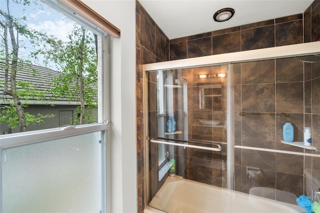 bathroom featuring an enclosed shower