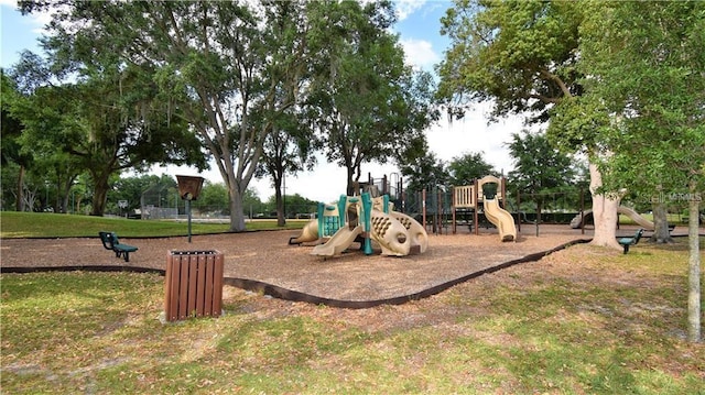 view of jungle gym with a lawn