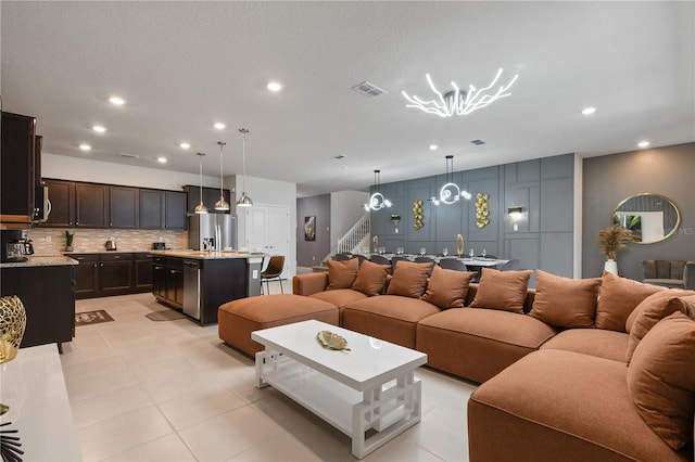 living room with light tile patterned floors