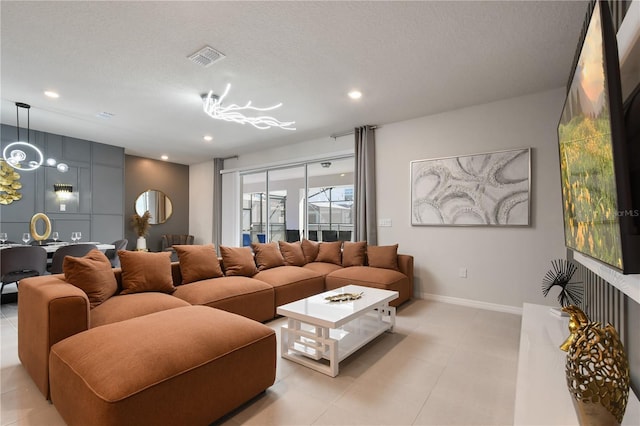 living room with a textured ceiling