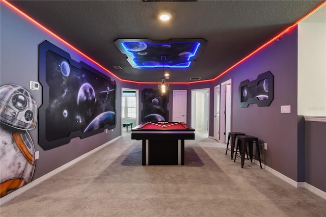 rec room featuring carpet floors, pool table, and a textured ceiling