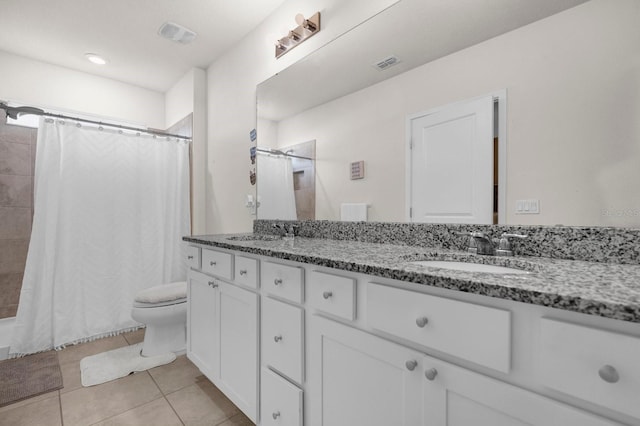 bathroom featuring vanity, tile patterned flooring, toilet, and a shower with shower curtain