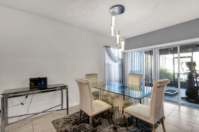 dining area with light tile patterned floors