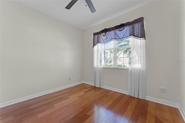 unfurnished room featuring wood-type flooring and ceiling fan