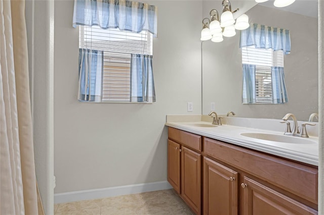 bathroom with vanity and tile patterned flooring