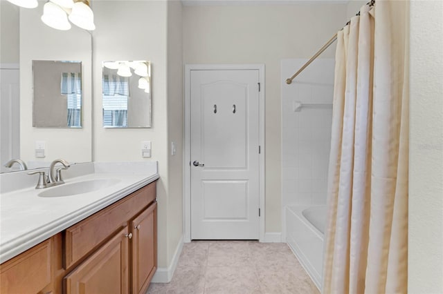 bathroom with shower / tub combo with curtain, tile patterned floors, and vanity