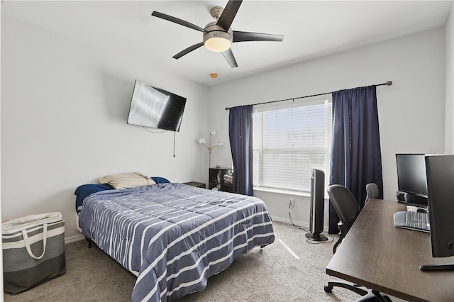 bedroom with ceiling fan and carpet floors