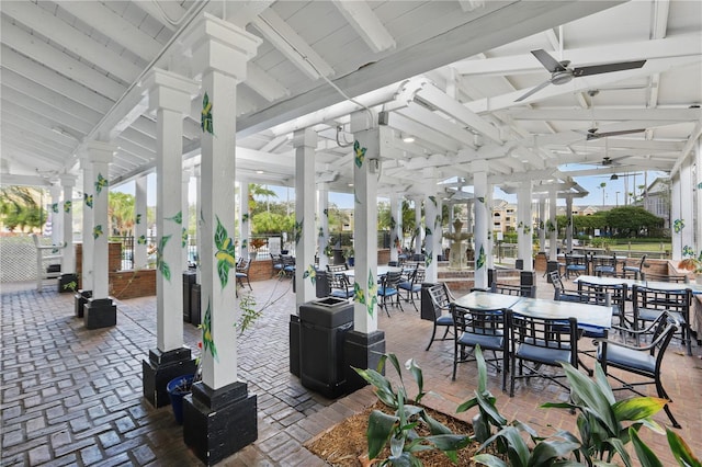 view of patio featuring ceiling fan