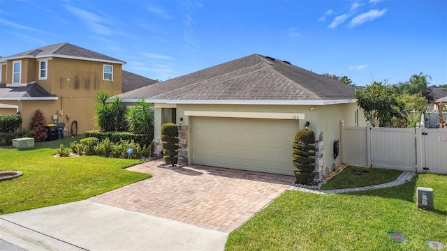 exterior space with a garage and a front lawn