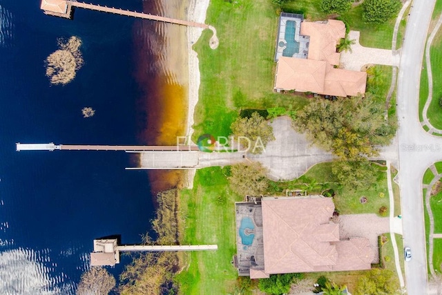 birds eye view of property featuring a water view