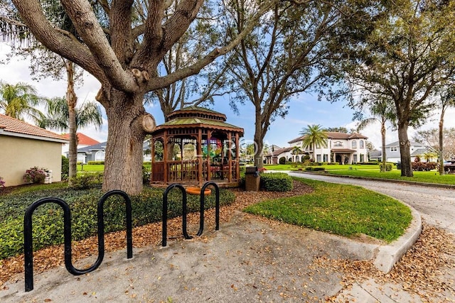 view of playground featuring a residential view and a gazebo