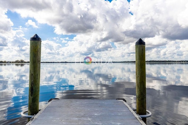 view of dock with a water view