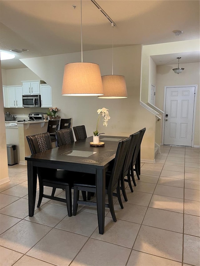 view of tiled dining space