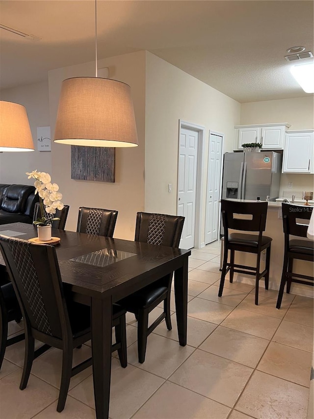 view of tiled dining room