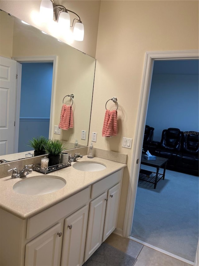 bathroom with vanity and tile patterned flooring